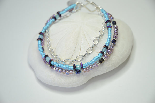 Aqua and Purple Fine silver seashell charm multi strand bracelet