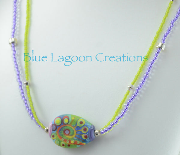 Bright Green and Purple 2 strand Necklace with Lampwork Bead by Michou
