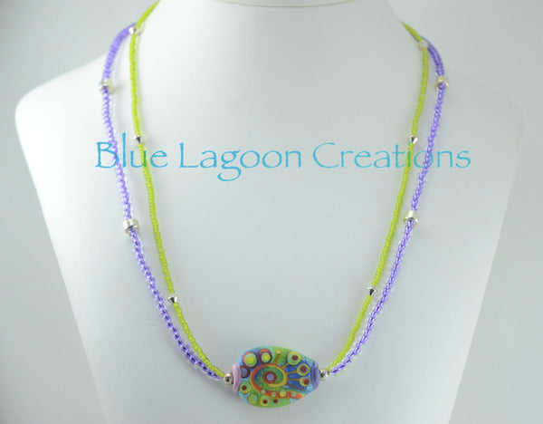 Bright Green and Purple 2 strand Necklace with Lampwork Bead by Michou