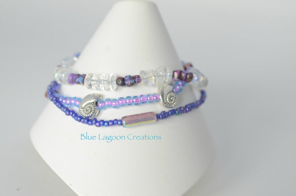 Three Strand Purple and Glass Shell Bracelet
