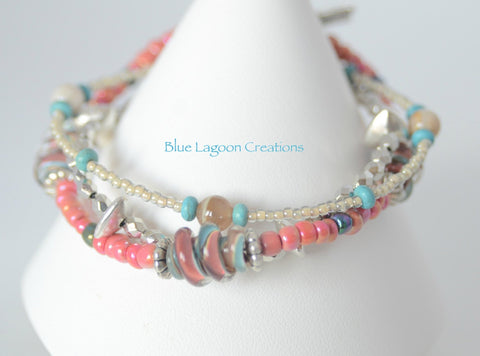 Three Strand Pink and Blue Bracelet with Lampwork Bead