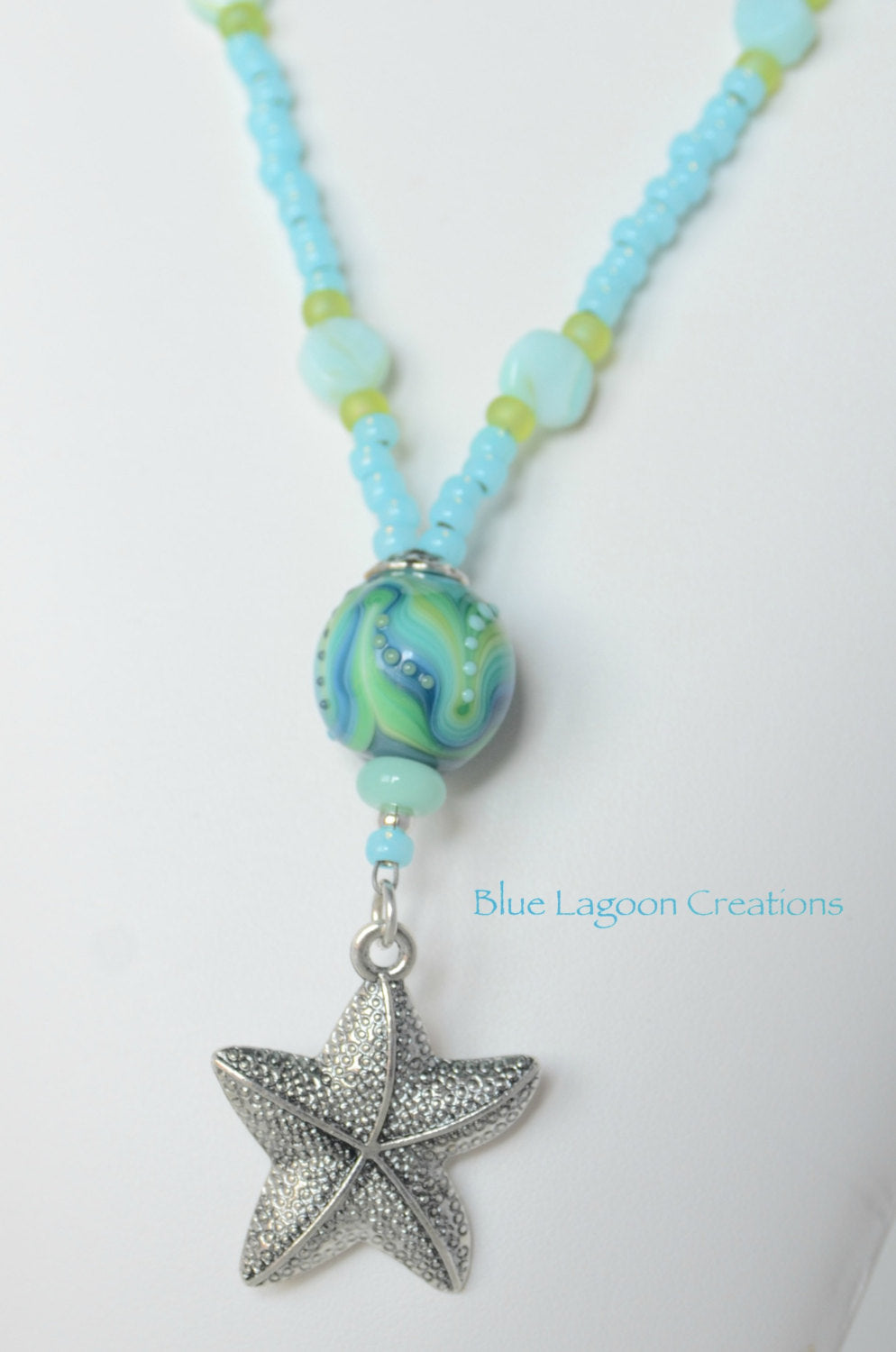Green and Blue Starfish Pendant Necklace with Lampwork Bead by Michal Silberberg