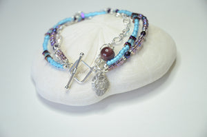 Aqua and Purple Fine silver seashell charm multi strand bracelet