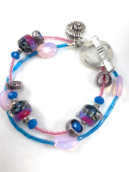Bright Pink and Blue Two Strand Beaded Bracelet with Seashell Charm