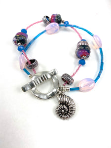 Bright Pink and Blue Two Strand Beaded Bracelet with Seashell Charm