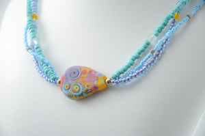Three Strand Purple and Green Lampwork Bead Necklace with Bead by Michou
